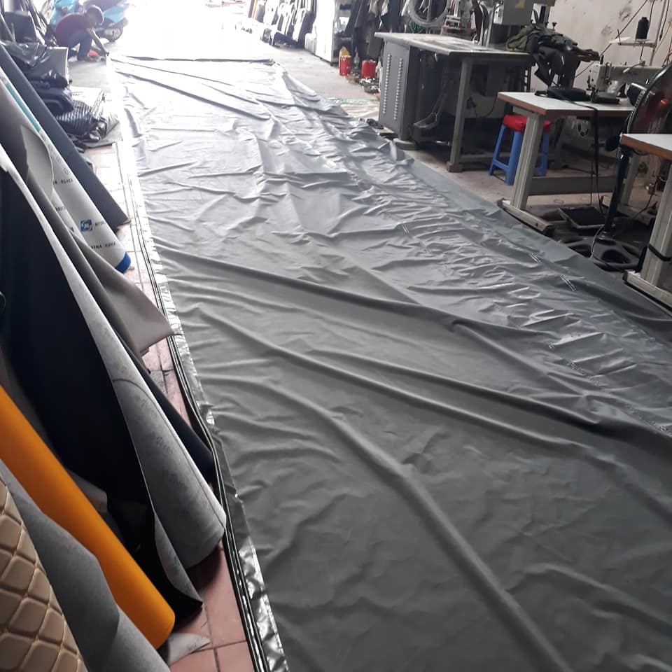 May ép bạt xe tải